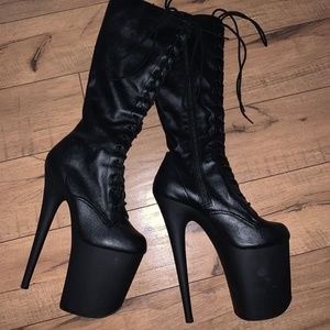 Black leather knee high Platform Pleasers 9” heels